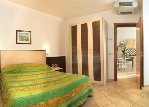 Postel nebo postele na pokoji v ubytování Residence Eurogarden