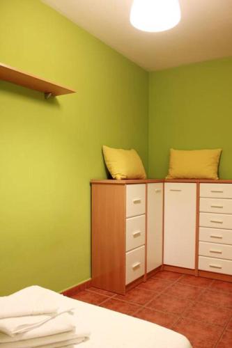 Katil atau katil-katil dalam bilik di PISO EXTERIOR COMPLETO A 20 ' DE BARCELONA.