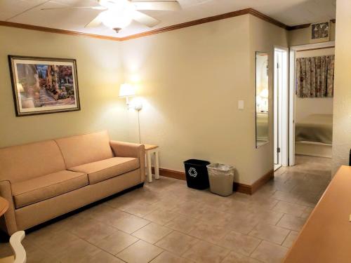 a living room with a couch and a table at Avondale by the Sea in Cape May