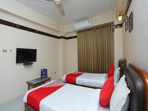 Cama o camas de una habitación en Hotel Amrit Regency