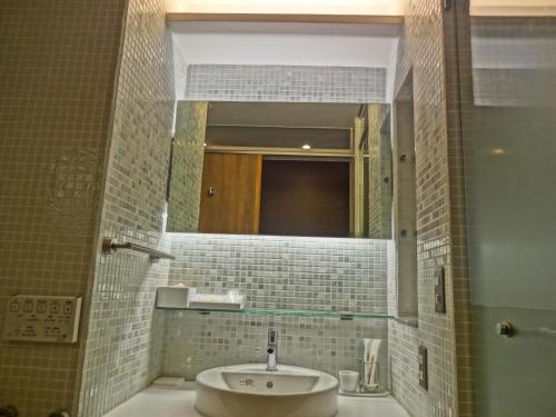 Ένα μπάνιο στο Hotel Spax Kusatsu