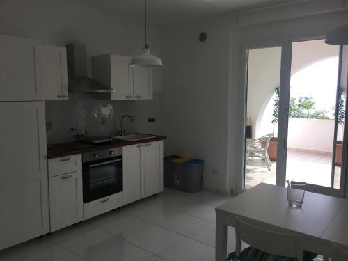 Kuchyň nebo kuchyňský kout v ubytování La Bouganville