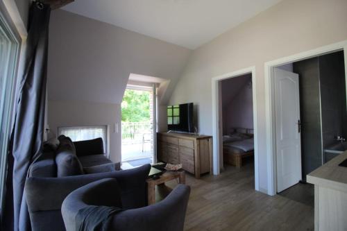 TV/trung tâm giải trí tại Ferienwohnung am Parsteinsee