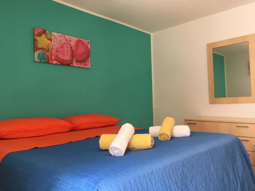 מיטה או מיטות בחדר ב-Mareblù