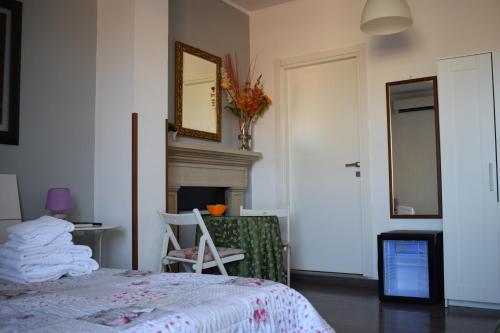 Cama o camas de una habitación en B&B Lost in Rome