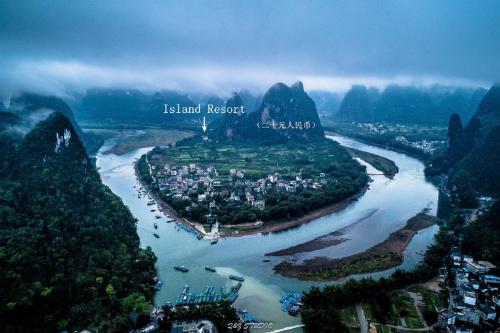 an aerial view of a river and a city at Li-river Island Resort Xingping Yangshuo in Yangshuo