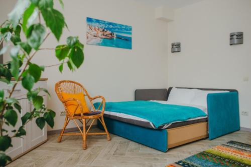 Ένα ή περισσότερα κρεβάτια σε δωμάτιο στο Стильная уютная апарт-студия SILENA