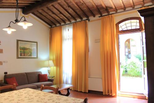 Postel nebo postele na pokoji v ubytování IL COLOMBAIO WINERY & Rooms