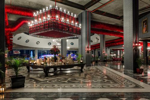 a rendering of a lobby with a large chandelier at Selectum Luxury Resort Belek in Belek