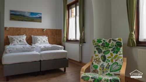 Postel nebo postele na pokoji v ubytování B&B Stoega