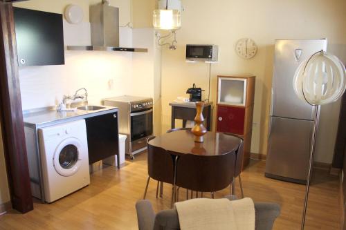 Kuchyň nebo kuchyňský kout v ubytování Dream Apartment