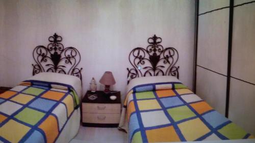 A bed or beds in a room at salento in relax