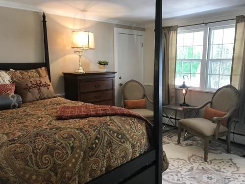 Ένα ή περισσότερα κρεβάτια σε δωμάτιο στο Starlight Lodge North Conway