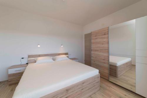 Ένα ή περισσότερα κρεβάτια σε δωμάτιο στο Sunset House
