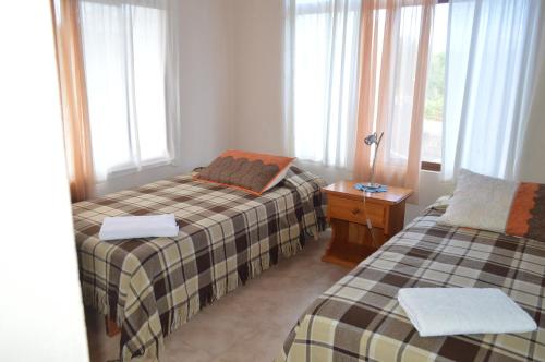 Posteľ alebo postele v izbe v ubytovaní Casa de Lelia