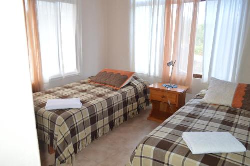 Postel nebo postele na pokoji v ubytování Casa de Lelia