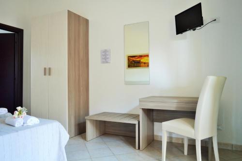 TV a/nebo společenská místnost v ubytování Sardegna Mer et Soleil in Olbia