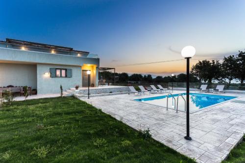 Πισίνα στο ή κοντά στο Iokasti Villa