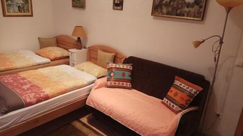 Säng eller sängar i ett rum på Holiday home Una-Mia