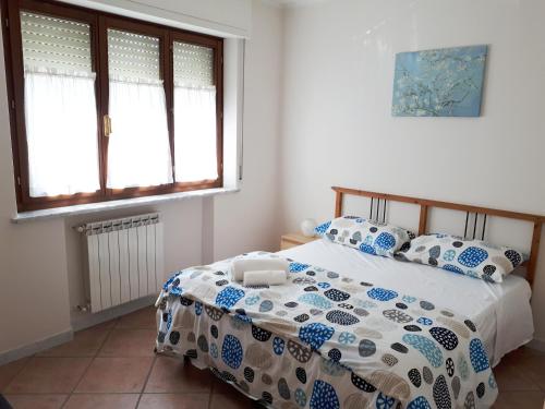 Katil atau katil-katil dalam bilik di Casa Mario dei Pini