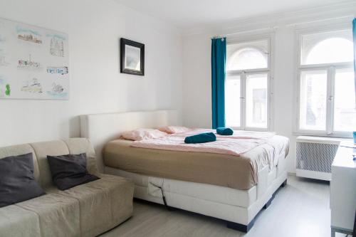 Posteľ alebo postele v izbe v ubytovaní Queen Bed Central Budapest