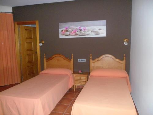 Hotel Rural La Encinaにあるベッド