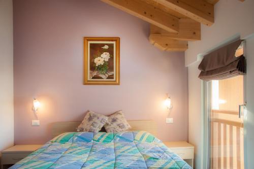 Postel nebo postele na pokoji v ubytování b&b Casa Tavernaro