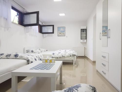Posteľ alebo postele v izbe v ubytovaní Apartman Maksimir Relax Zagreb-75m2
