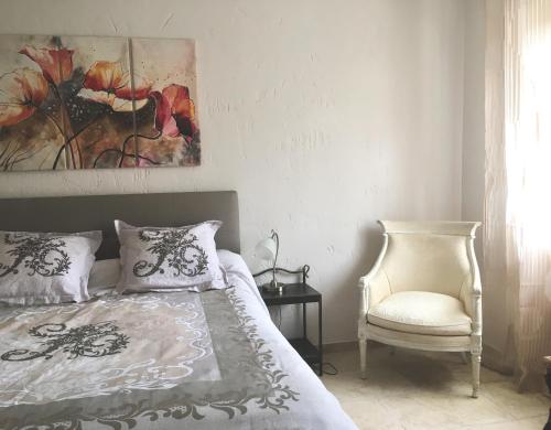 Postel nebo postele na pokoji v ubytování BASTIDE DE L' ORANGERAIE