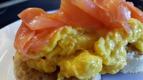 a sandwich with eggs and tomatoes on a plate at Crofthead Farm House in Tarbolton