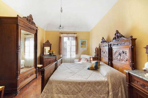 Letto o letti in una camera di Residenza D'Epoca Palazzo Buonaccorsi