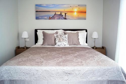 Cama o camas de una habitación en Melody Apartments