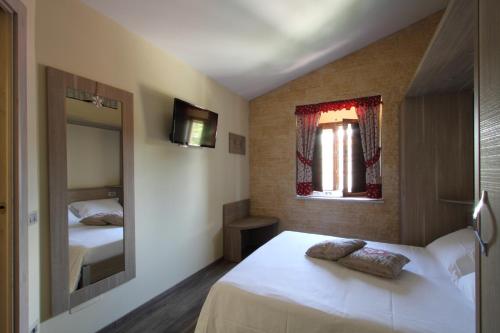 Posteľ alebo postele v izbe v ubytovaní "Il Viottolo" Rooms and Breakfast