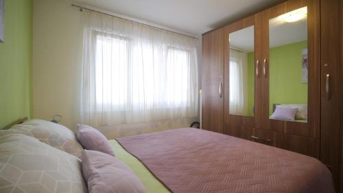Katil atau katil-katil dalam bilik di Apartment Ivana