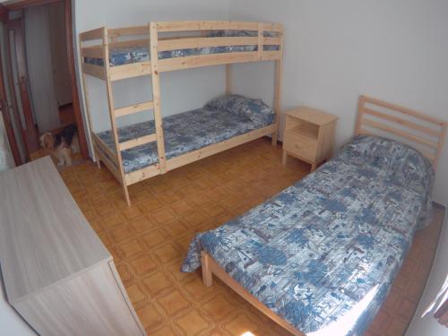 Postel nebo postele na pokoji v ubytování Gli Ulivi di Nesso