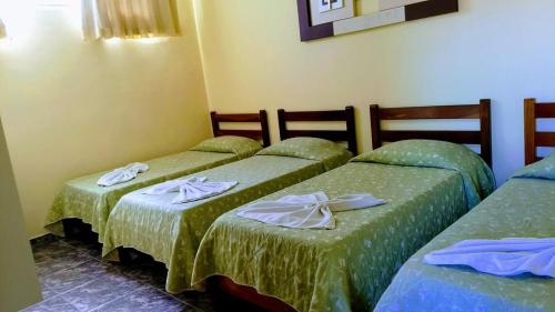 Postel nebo postele na pokoji v ubytování Hotel Telles