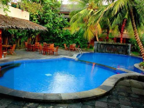 Bazén v ubytování Nyiur Resort Hotel nebo v jeho okolí