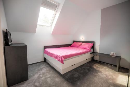 Postel nebo postele na pokoji v ubytování Golf apartment with SPA tickets discount