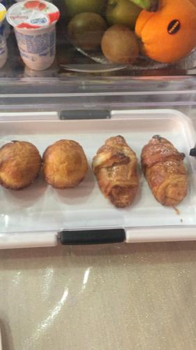 a tray of pastries on a shelf in a refrigerator at Mattandre in Monteroni di Lecce