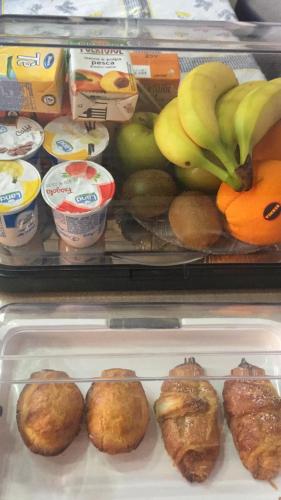 a refrigerator filled with lots of fresh fruits and vegetables at Mattandre in Monteroni di Lecce
