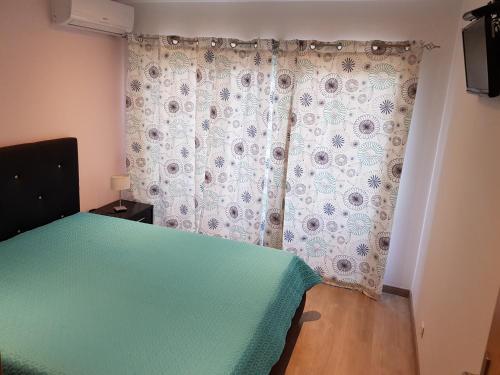 Postel nebo postele na pokoji v ubytování Apartamento Portimão