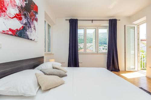 Posteľ alebo postele v izbe v ubytovaní Downtown Serenity House
