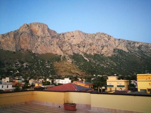 a view of a mountain from the roof of a building at La Casa del Sole in Cinisi