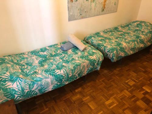 Posteľ alebo postele v izbe v ubytovaní MONKEY Apartment
