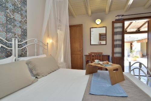 Llit o llits en una habitació de Villa Giannina