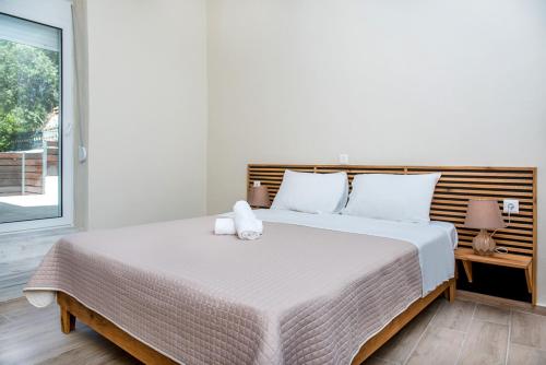 Postel nebo postele na pokoji v ubytování Elegant Apartment