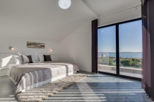 Postel nebo postele na pokoji v ubytování Villa Panorama