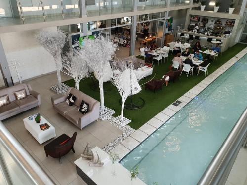 an overhead view of a restaurant with a swimming pool at Chill Pepper Boutique Hotel in Nelspruit