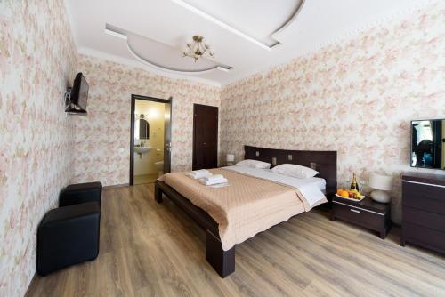 Кровать или кровати в номере Hotel Fusion