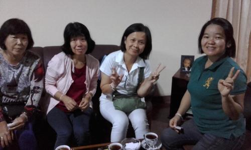 a group of women sitting on a couch at Mama's Hostel by Taprobane in Negombo